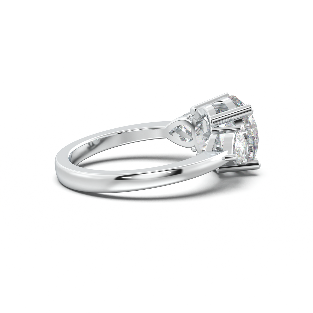 Round Pear Three-Stone Engagement Ring