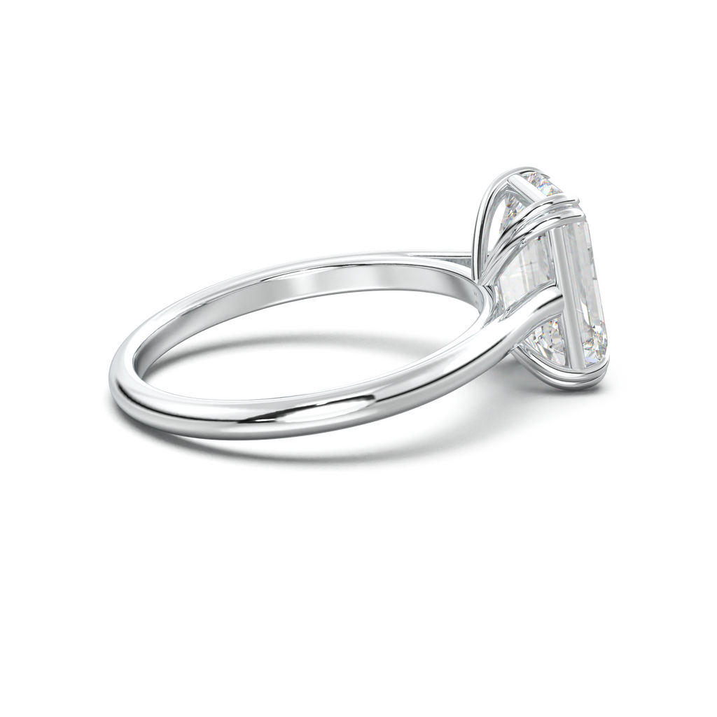 Emerald Solitaire Engagement Ring