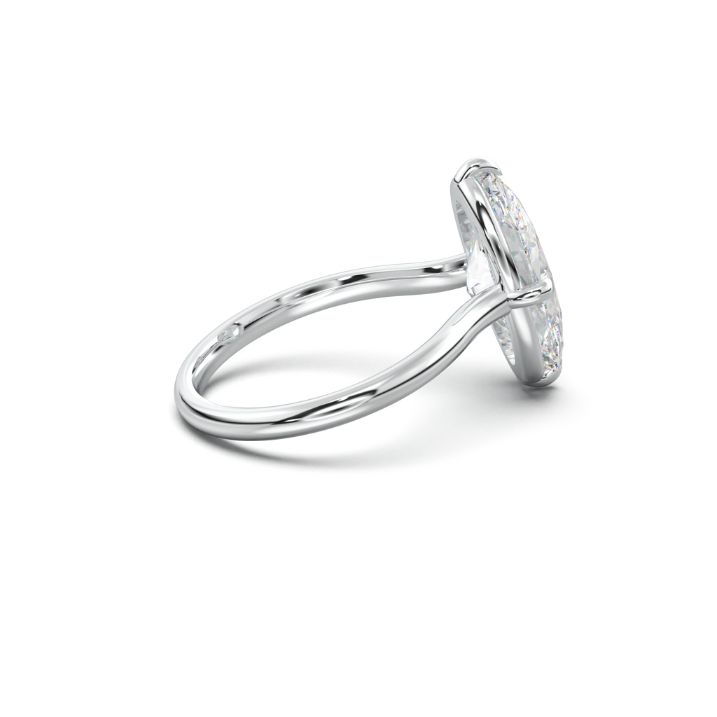 Elongated Moval Solitaire Engagement Ring