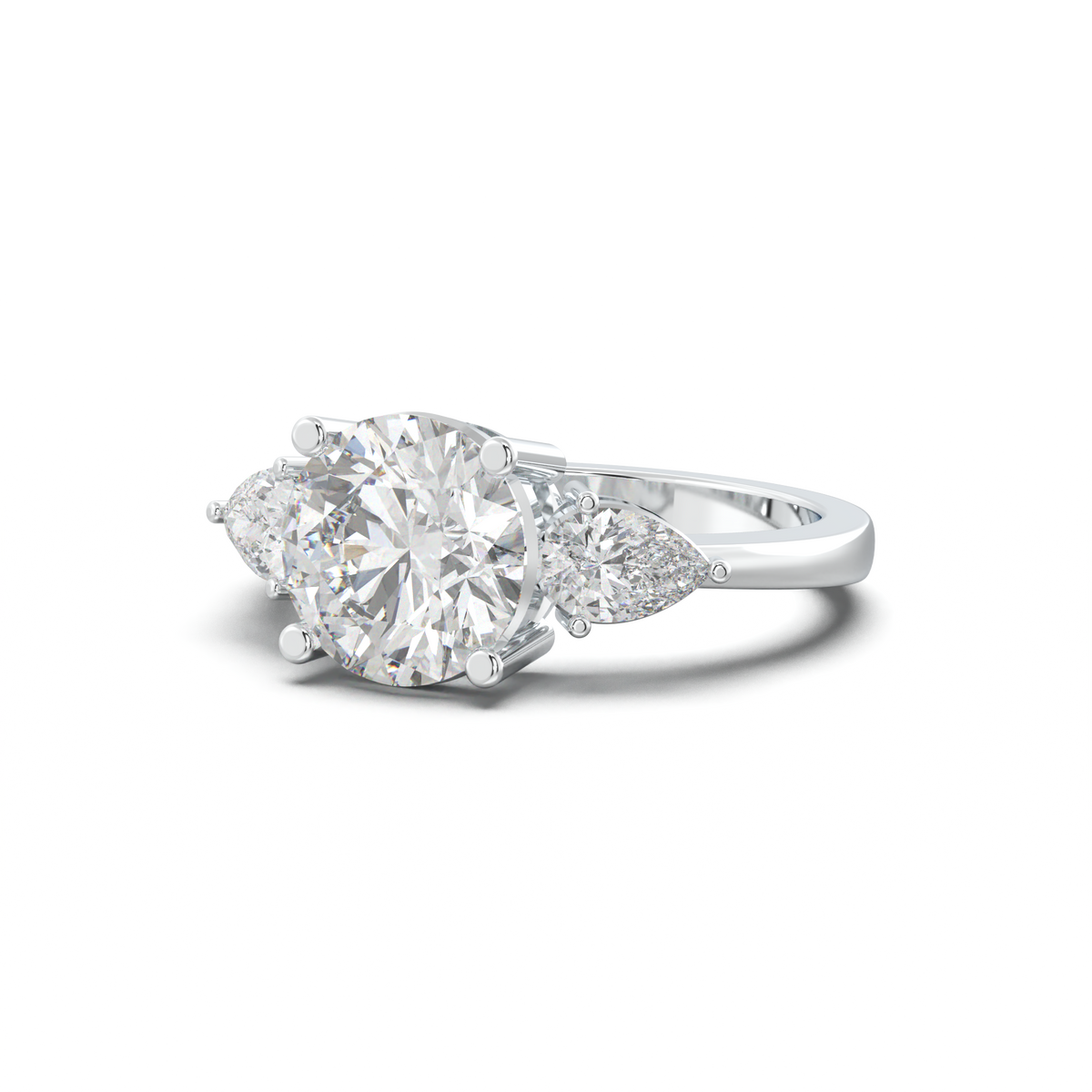 Round Pear Three-Stone Engagement Ring