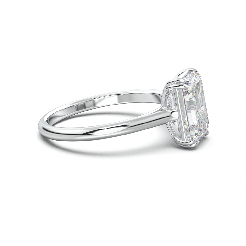 Emerald Solitaire Engagement Ring