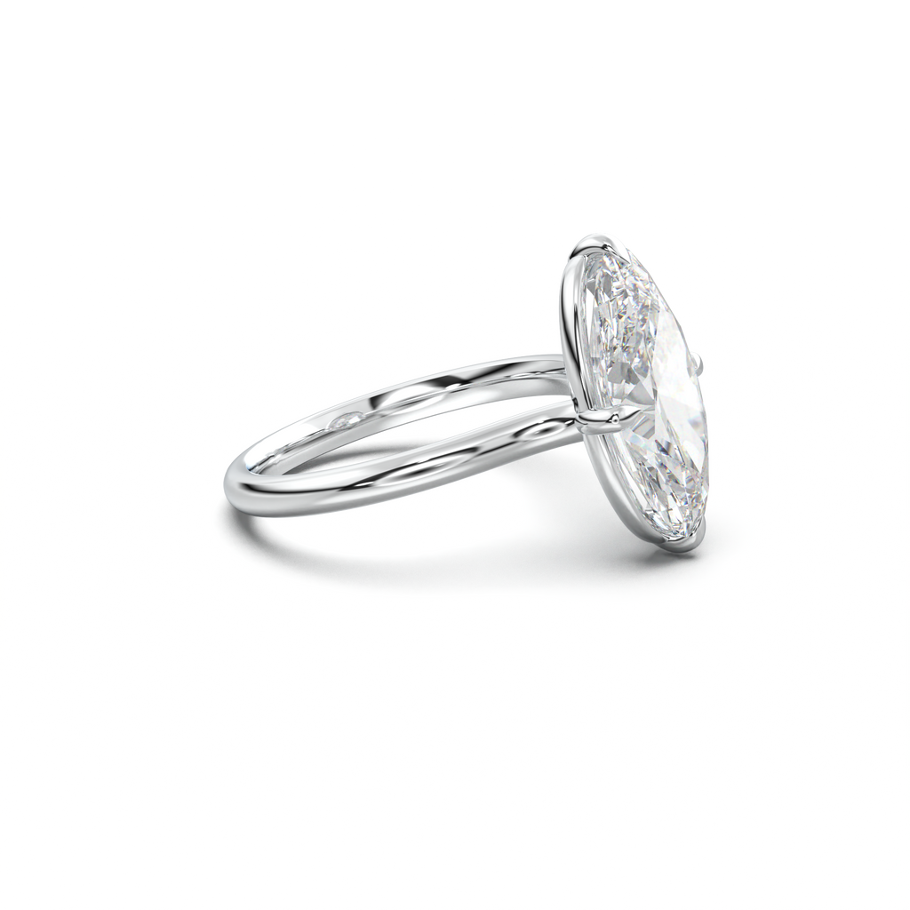 Elongated Moval Solitaire Engagement Ring