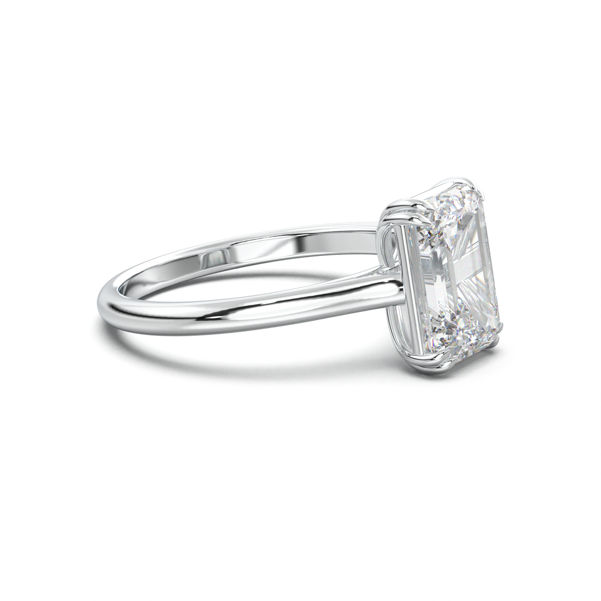 Emerald Solitaire Engagement Ring