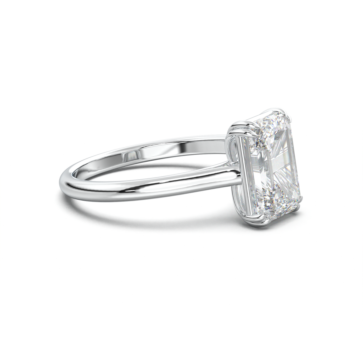 Emerald Solitaire Engagement Ring