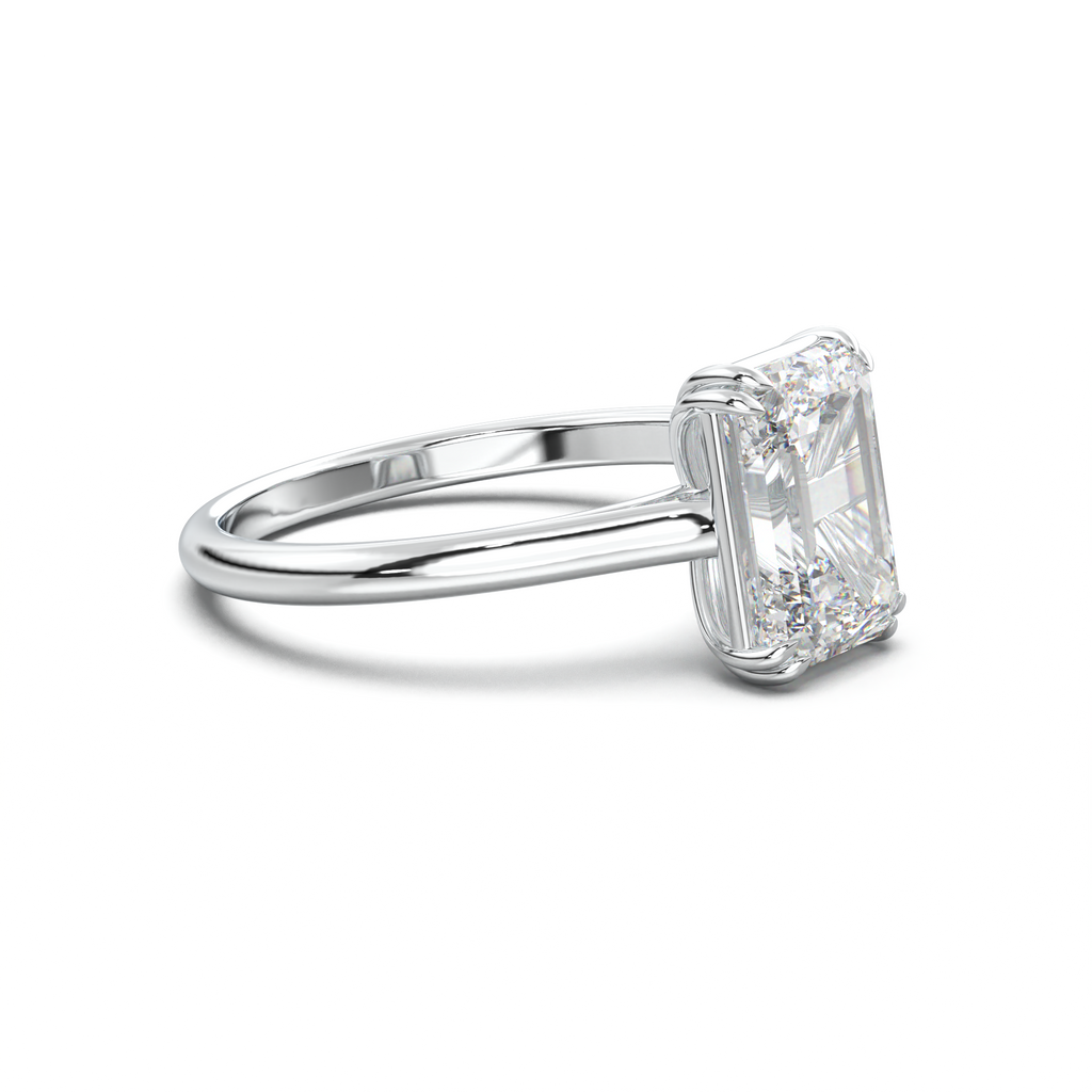 Emerald Solitaire Engagement Ring