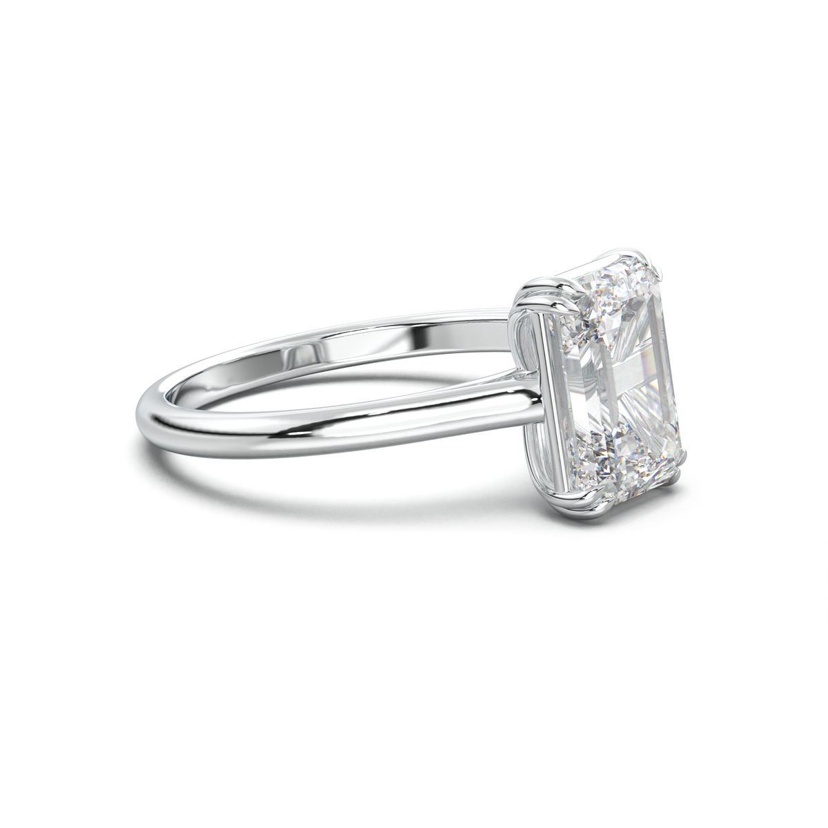 Emerald Solitaire Engagement Ring