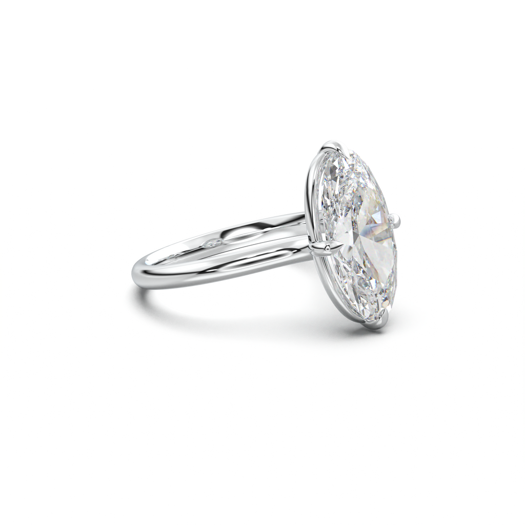 Elongated Moval Solitaire Engagement Ring