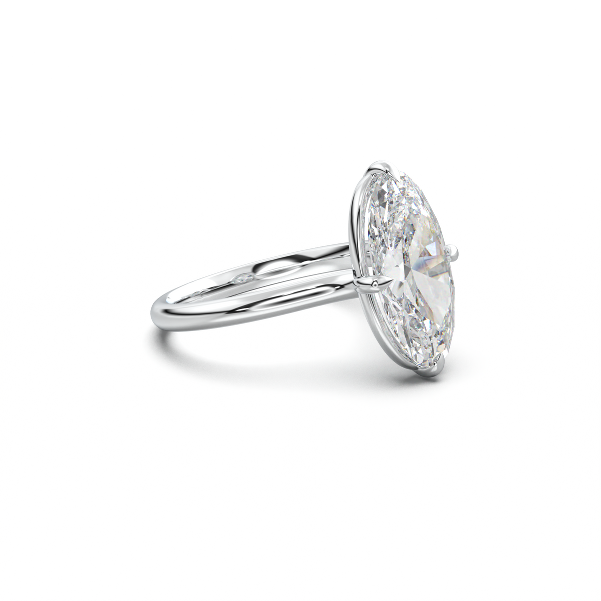 Elongated Moval Solitaire Engagement Ring