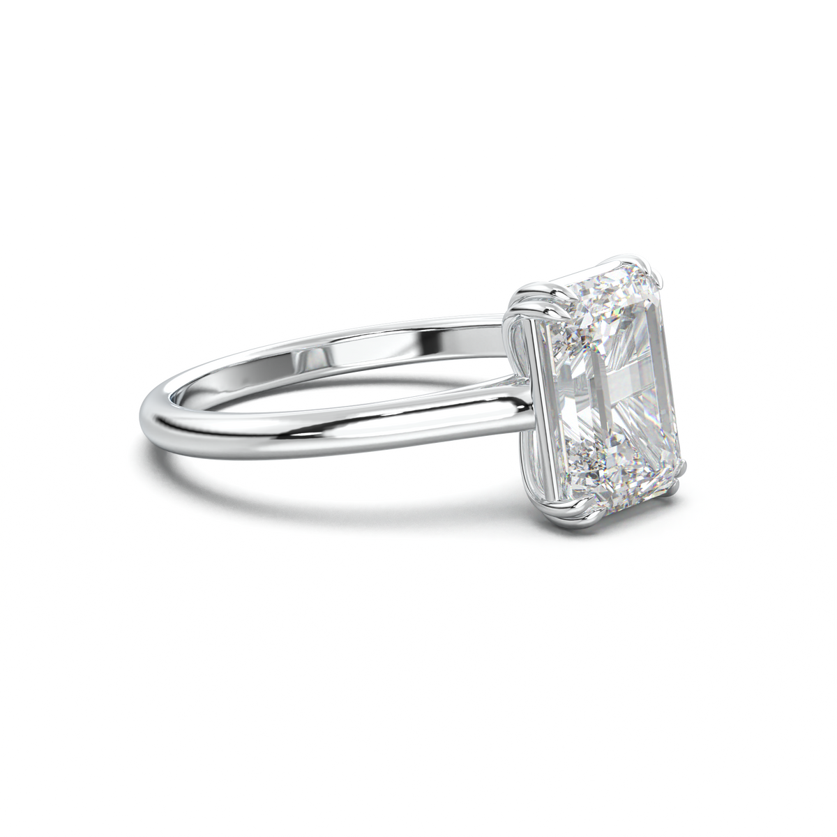 Emerald Solitaire Engagement Ring