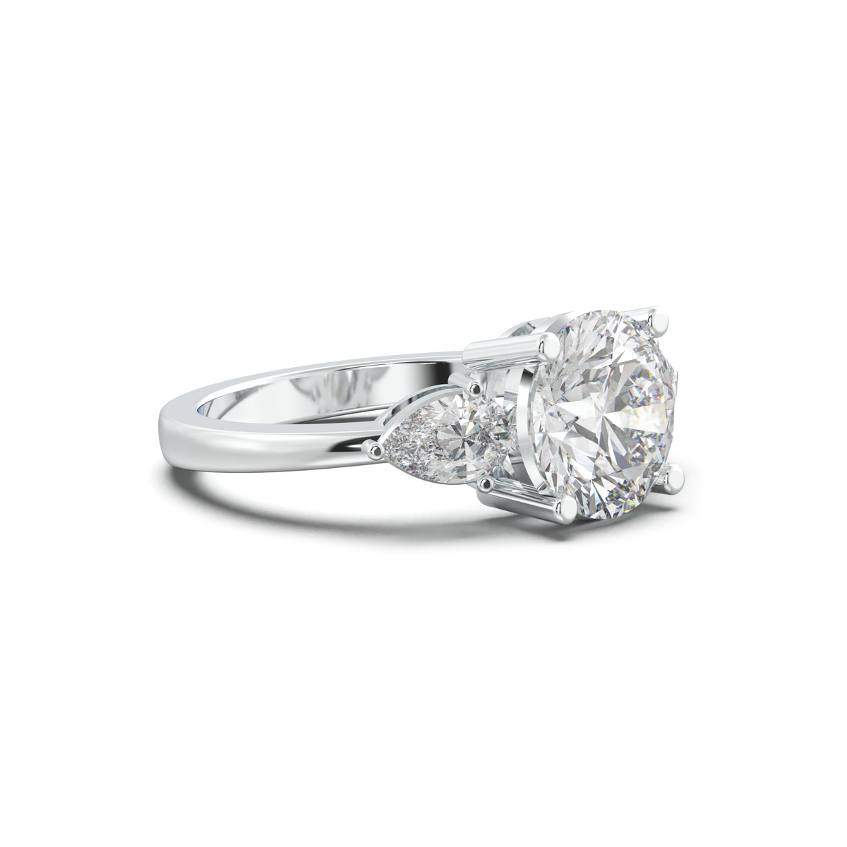Round Pear Three-Stone Engagement Ring