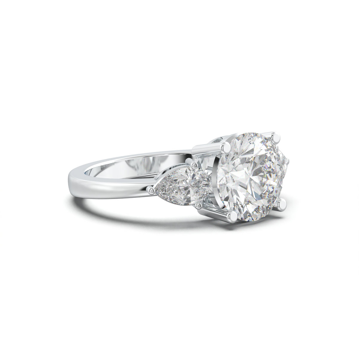 Round Pear Three-Stone Engagement Ring