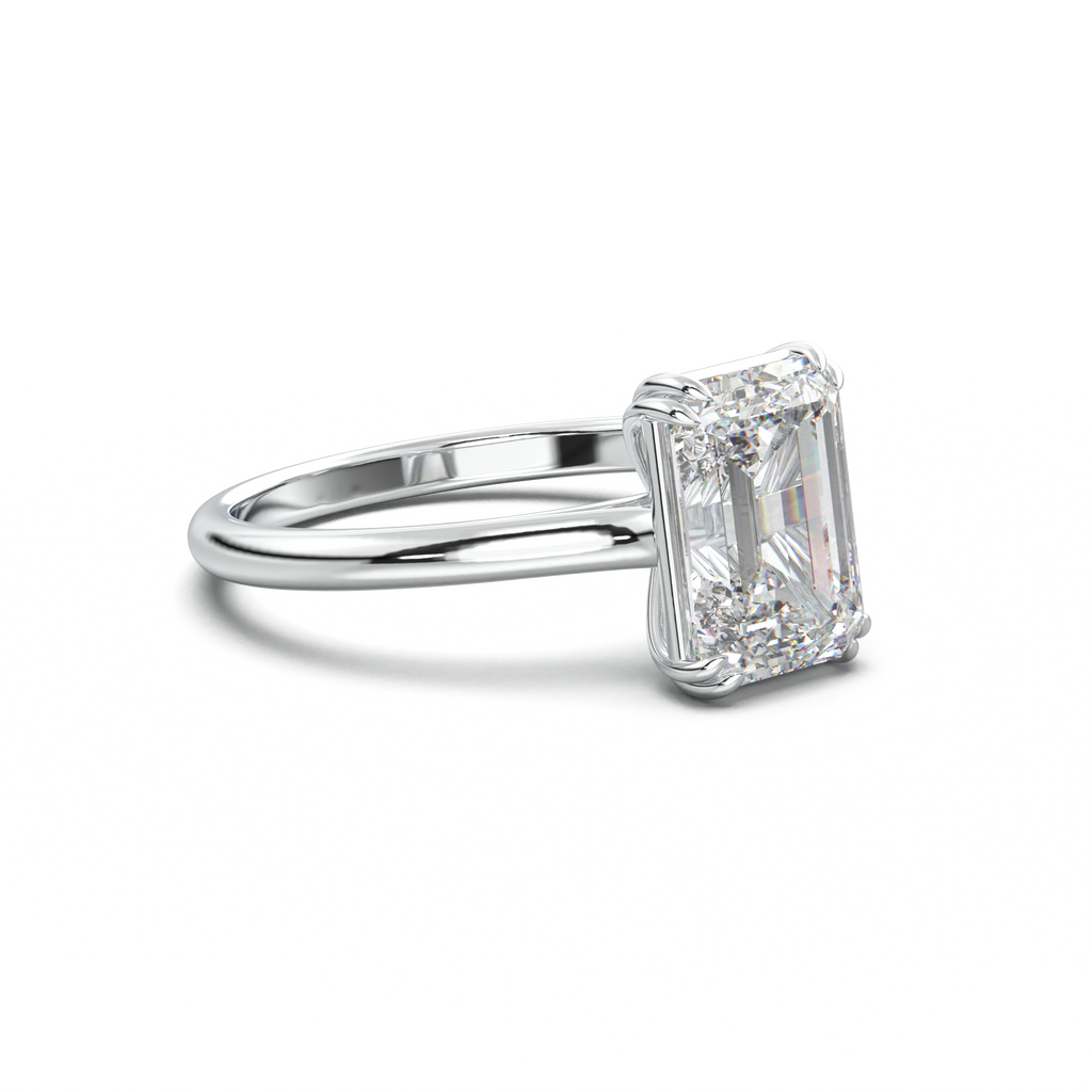 Emerald Solitaire Engagement Ring