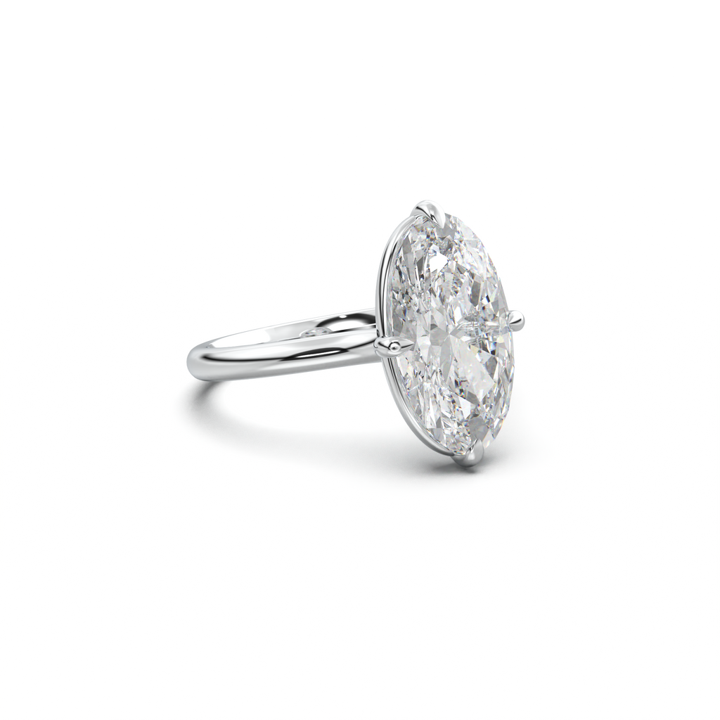 Elongated Moval Solitaire Engagement Ring