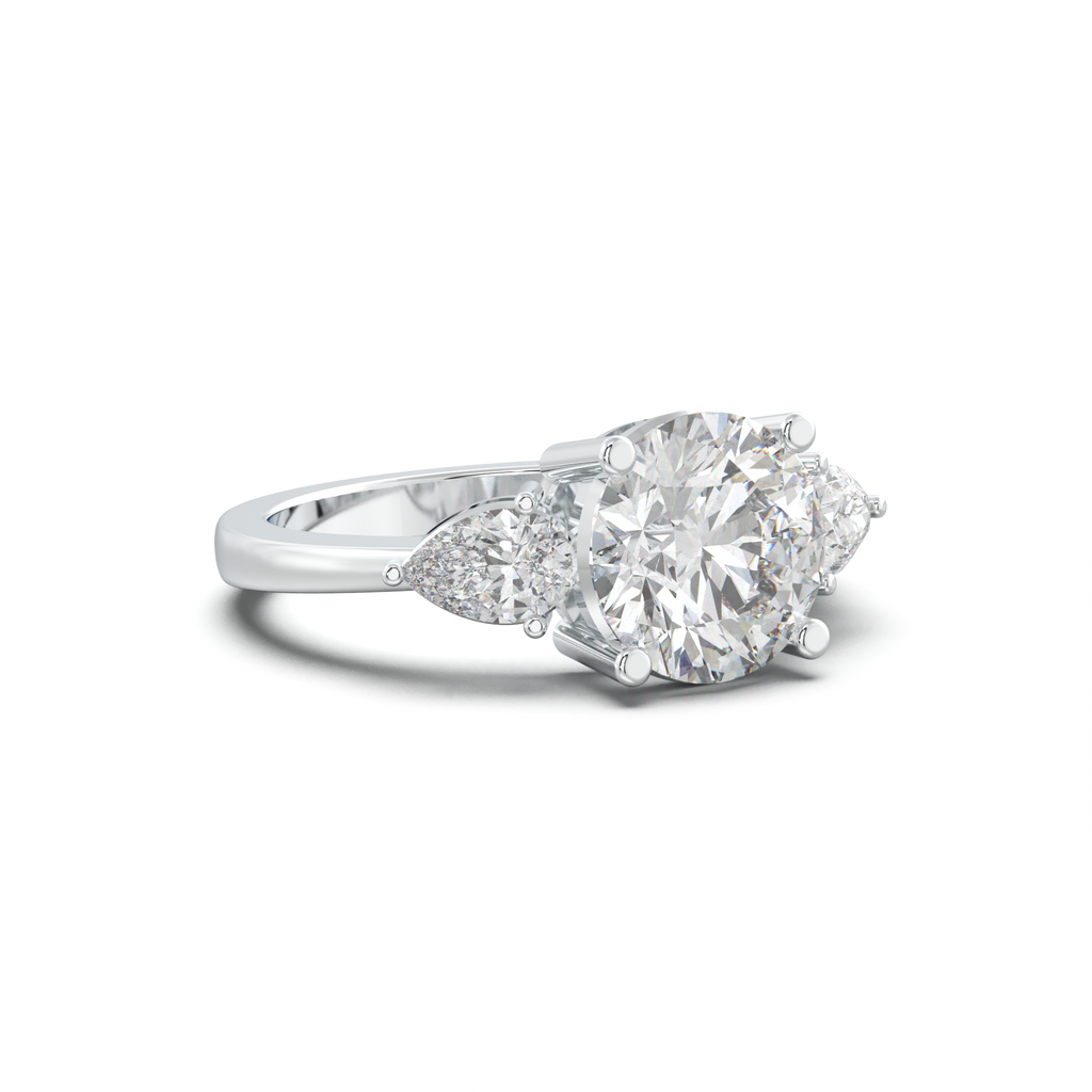 Round Pear Three-Stone Engagement Ring