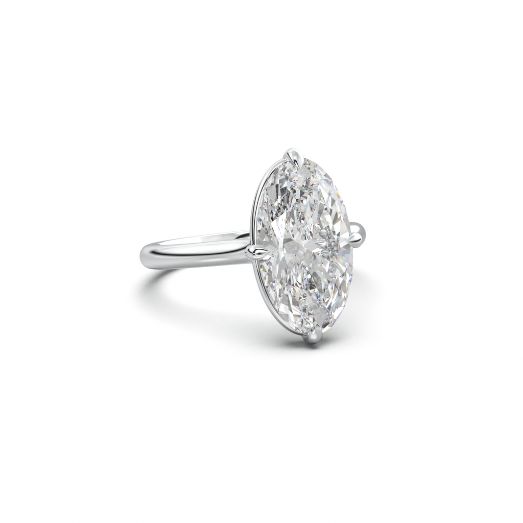 Elongated Moval Solitaire Engagement Ring