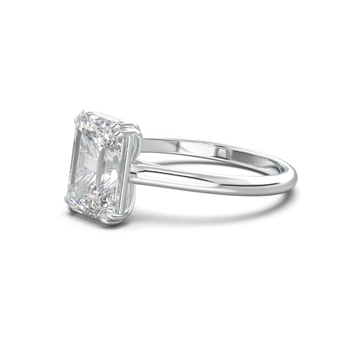 Emerald Solitaire Engagement Ring