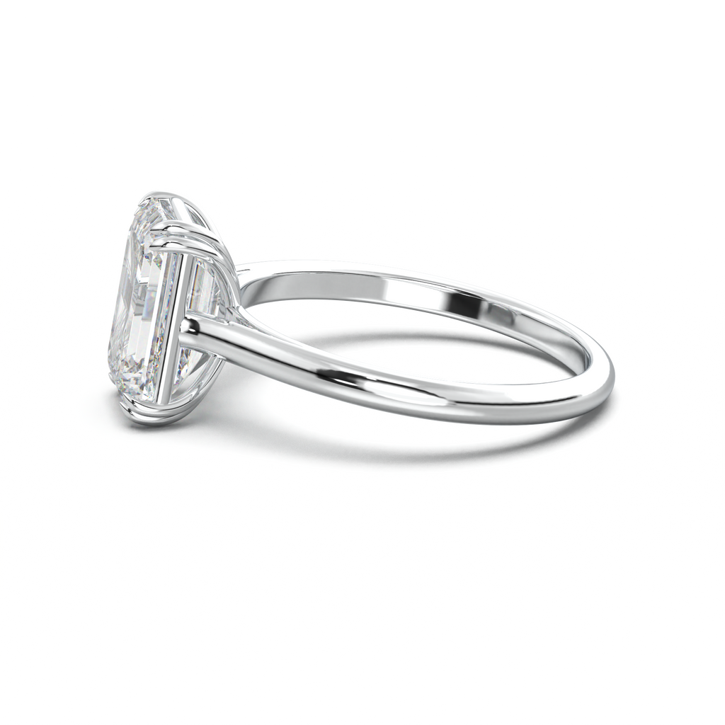 Emerald Solitaire Engagement Ring