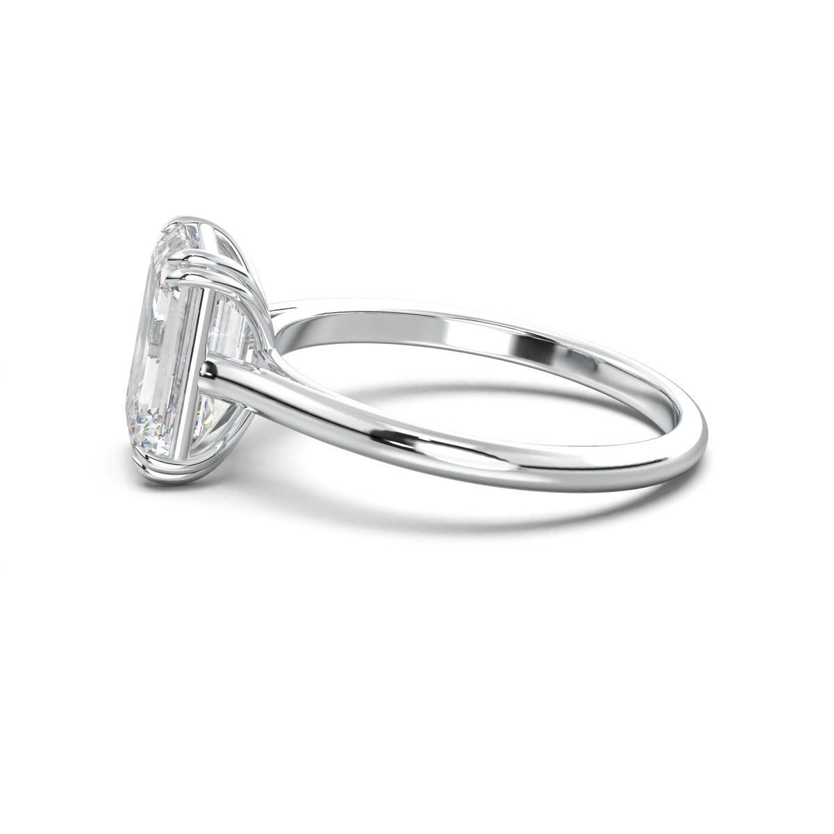 Emerald Solitaire Engagement Ring