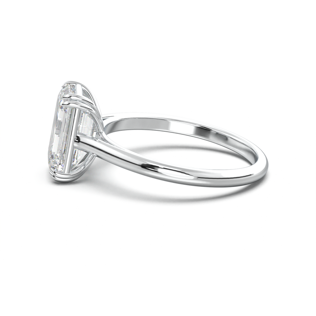 Emerald Solitaire Engagement Ring