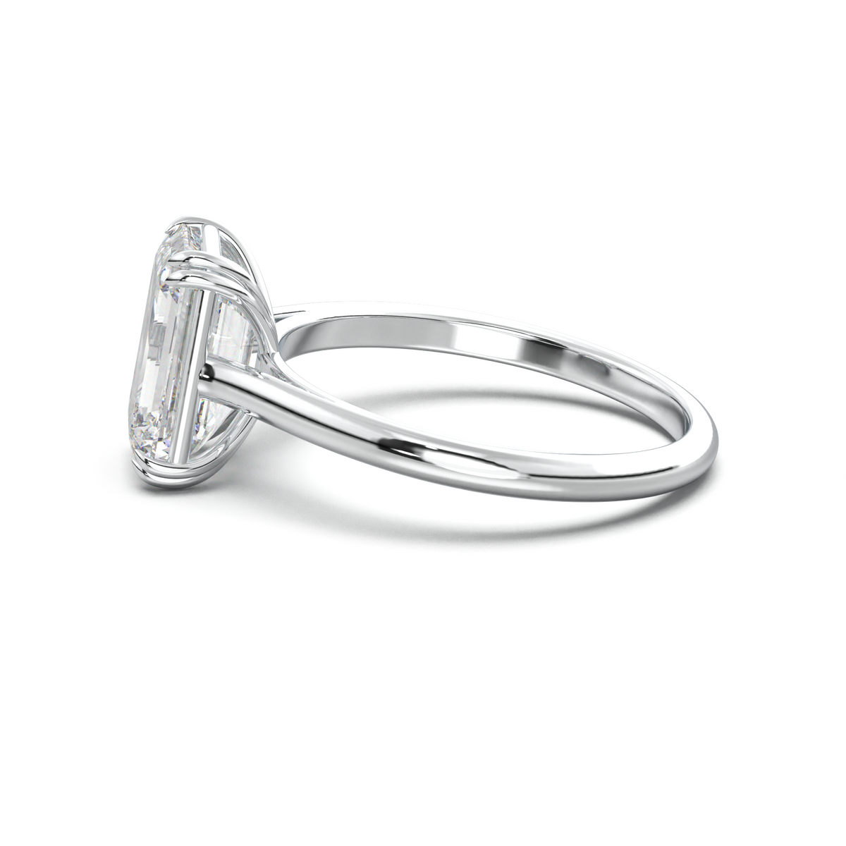 Emerald Solitaire Engagement Ring