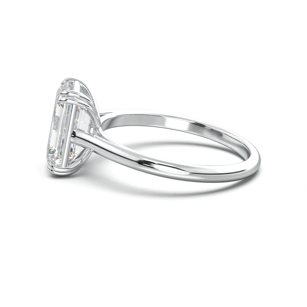 Emerald Solitaire Engagement Ring