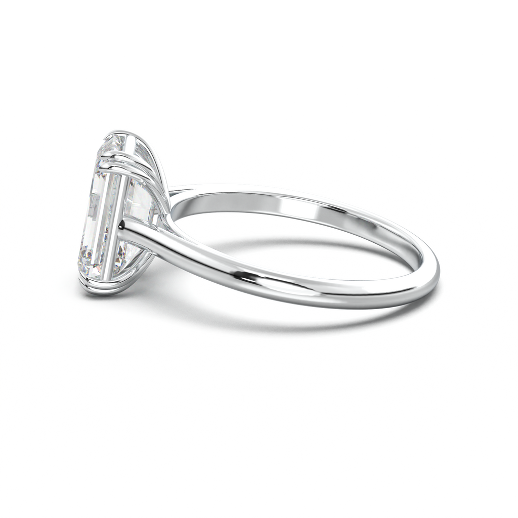 Emerald Solitaire Engagement Ring