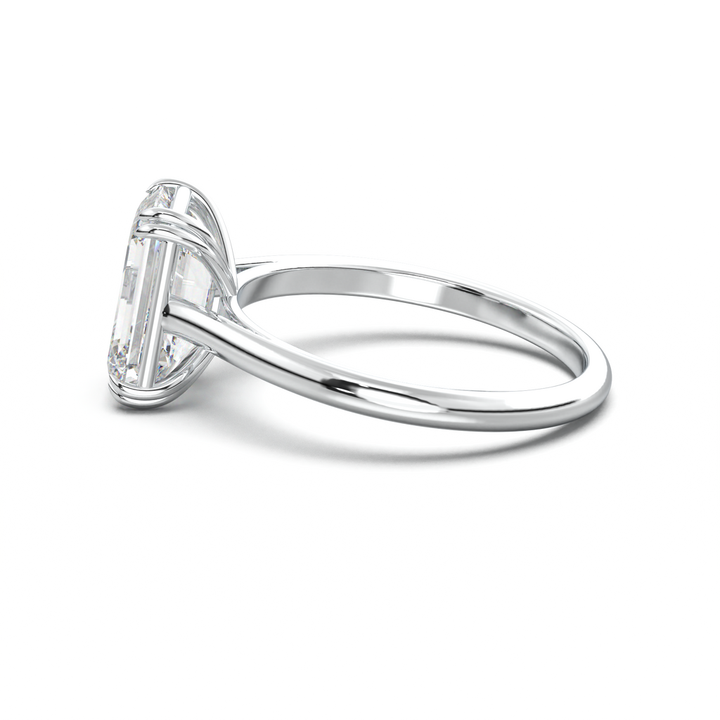 Emerald Solitaire Engagement Ring