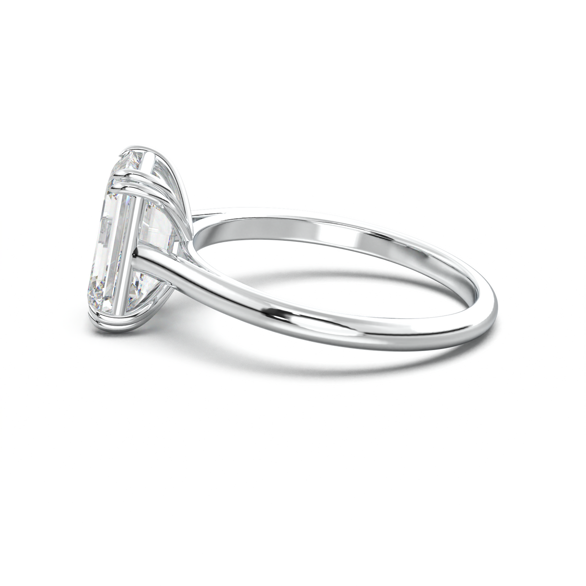 Emerald Solitaire Engagement Ring