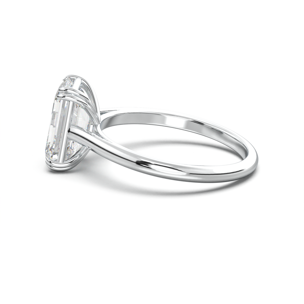 Emerald Solitaire Engagement Ring