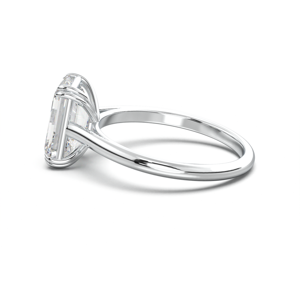 Emerald Solitaire Engagement Ring