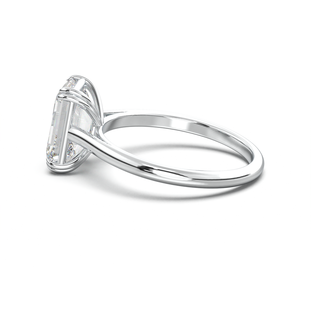 Emerald Solitaire Engagement Ring