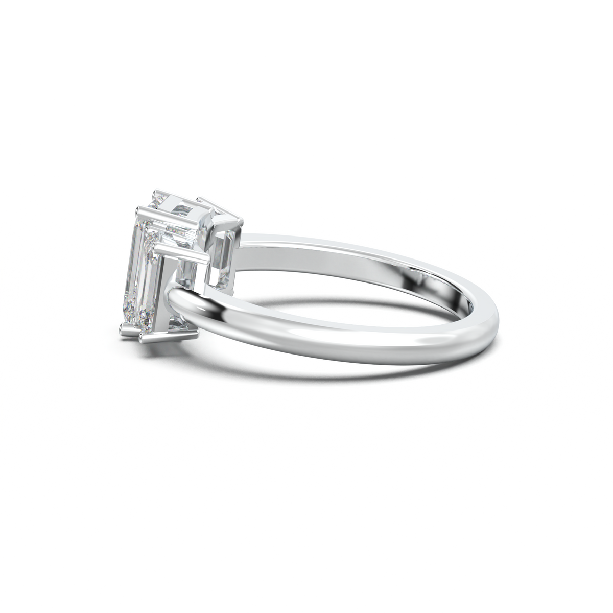 Emerald Three-Stone Engagement Ring