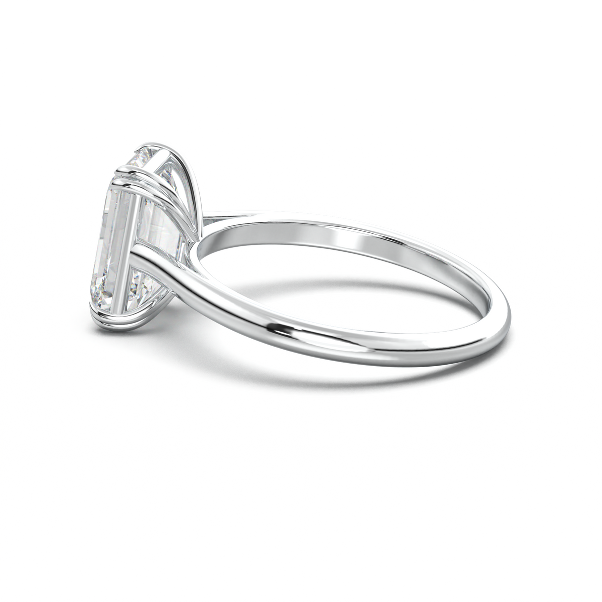 Emerald Solitaire Engagement Ring