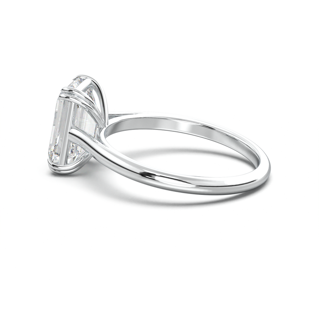 Emerald Solitaire Engagement Ring