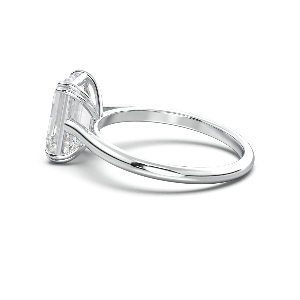 Emerald Solitaire Engagement Ring
