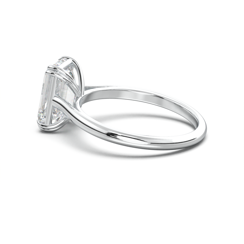 Emerald Solitaire Engagement Ring