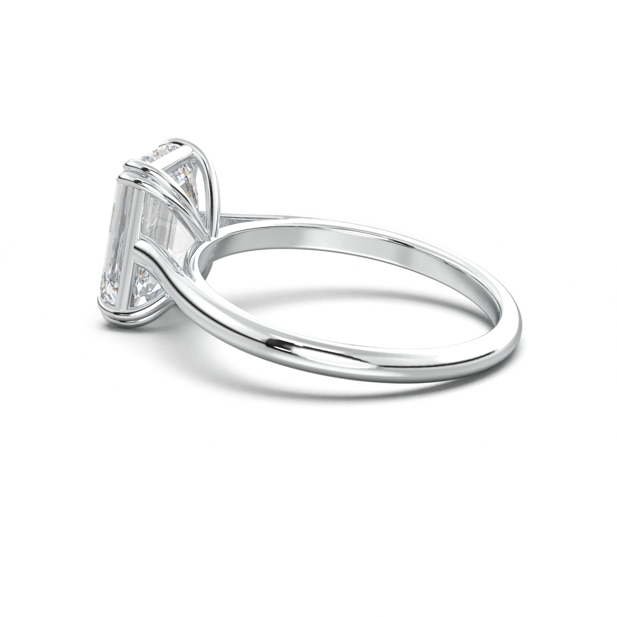 Emerald Solitaire Engagement Ring