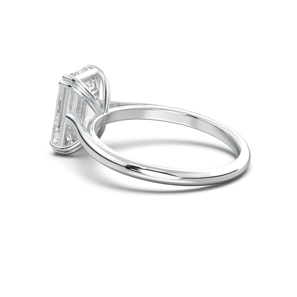 Emerald Solitaire Engagement Ring