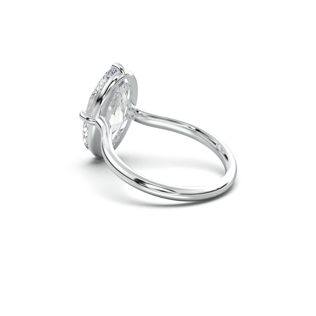 Elongated Moval Solitaire Engagement Ring
