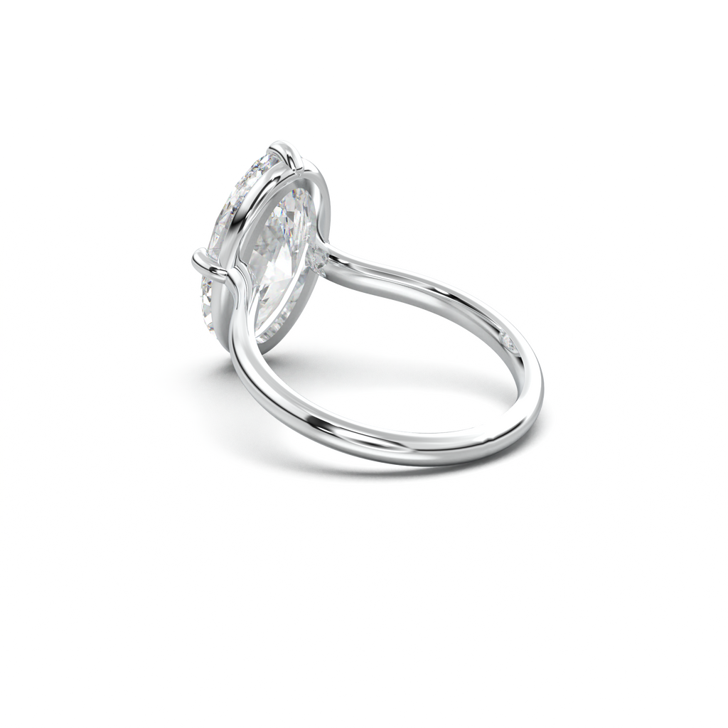 Elongated Moval Solitaire Engagement Ring