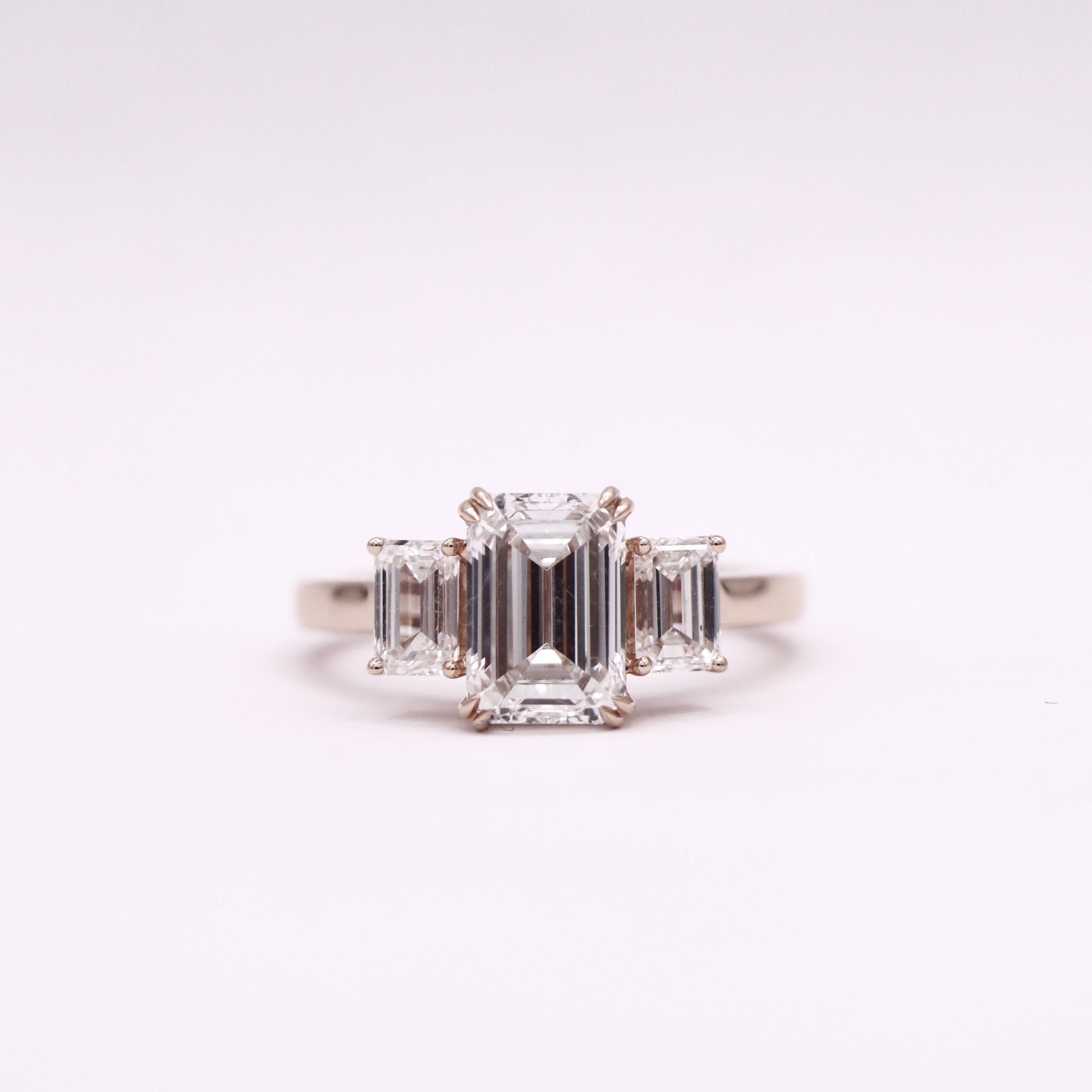 Trinity Hidden Halo Emerald Ring